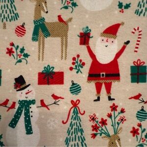 Holiday Fabric with Santa and Snowman in Red and Green